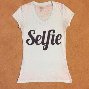 Light blue V neck T-shirt